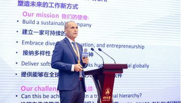 Ali E. Cevik gets an award in Beijing, China.